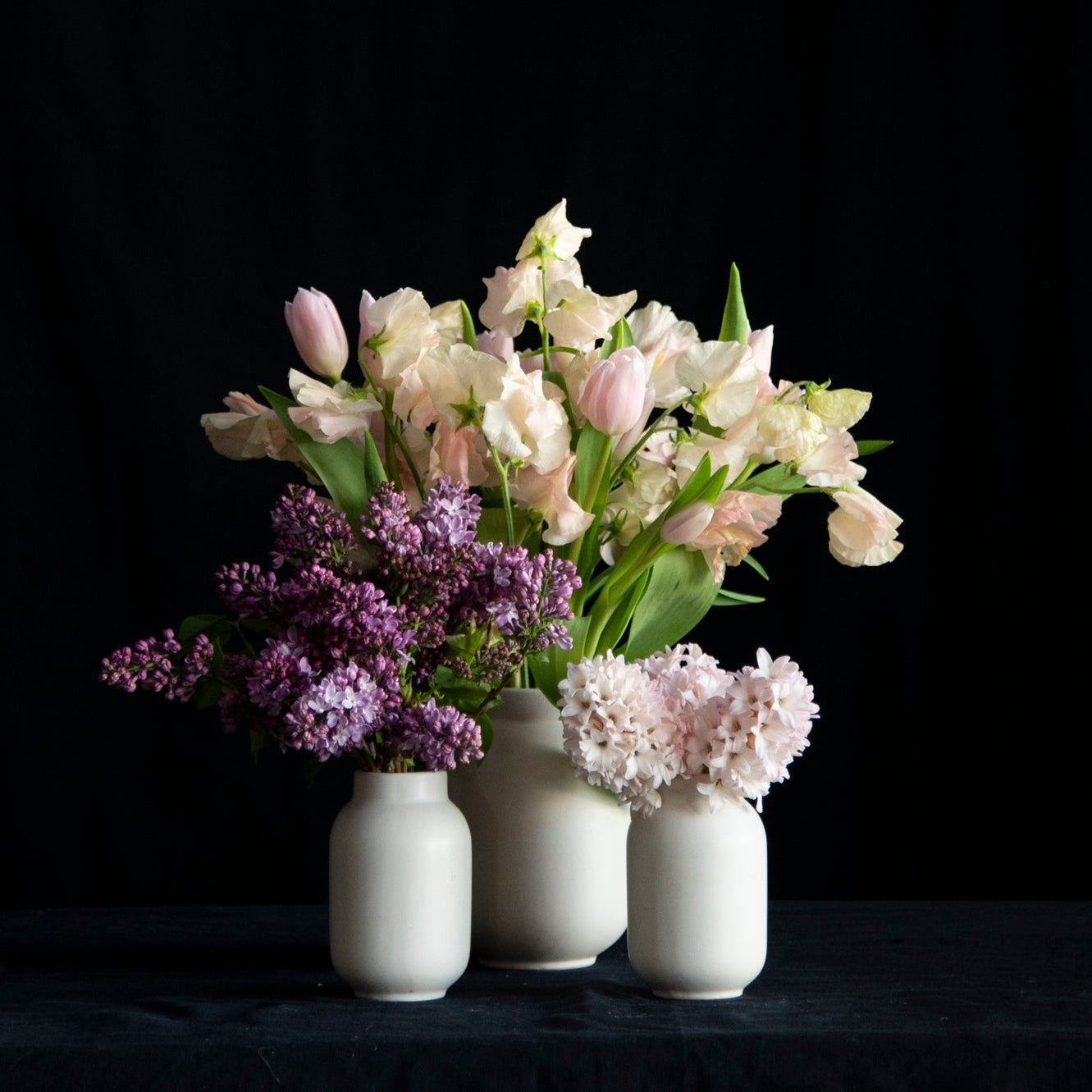 trio of matte vases filled w fragrant stems