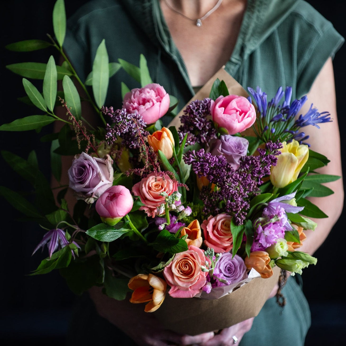 A bouquet of seasonal stems and peonies