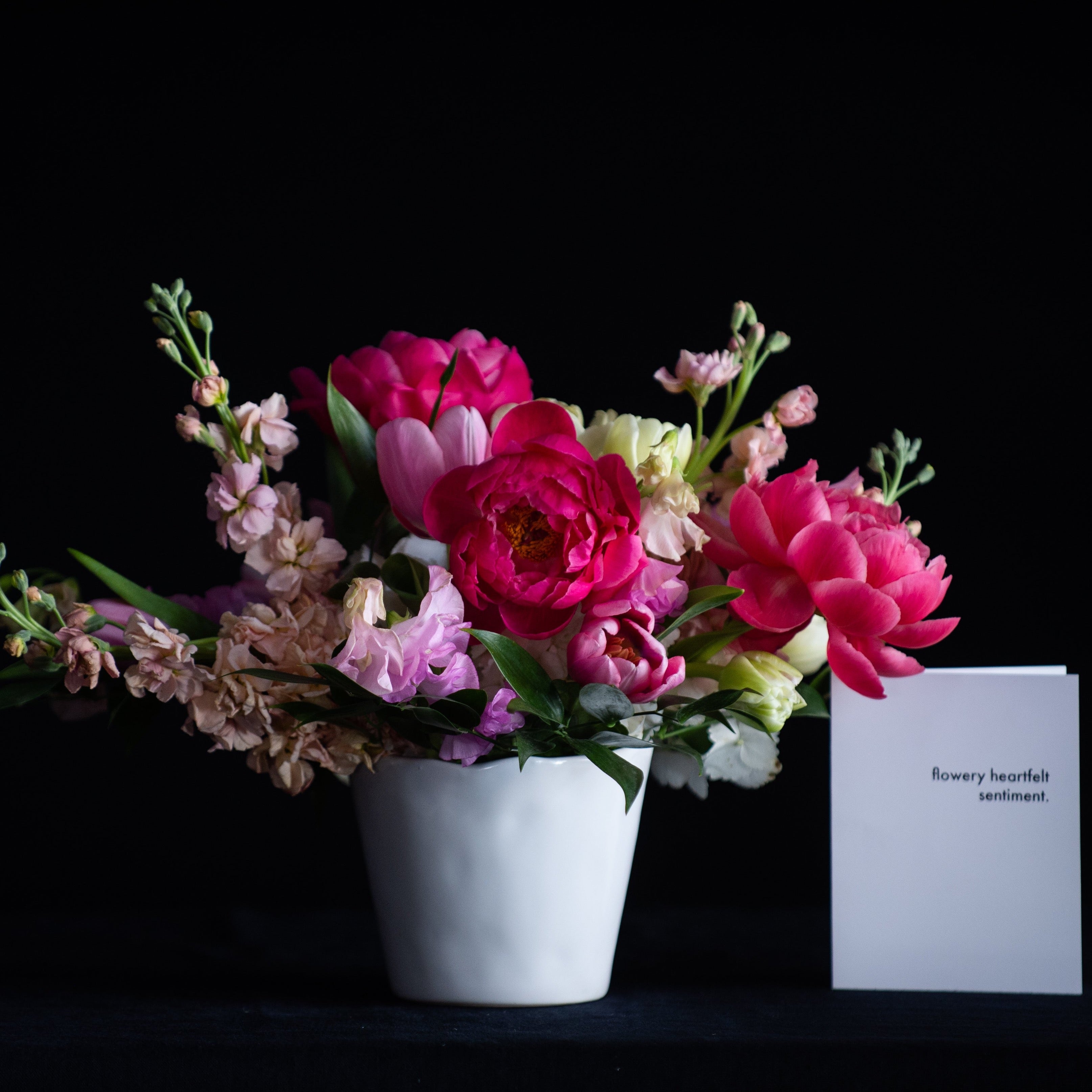 Peonies, tulips, hydrangea, and stock in pinks for Mothers Day