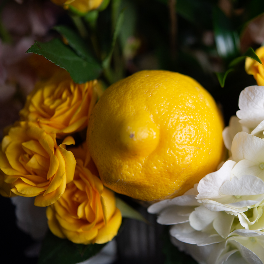 Details of floral design with lemon