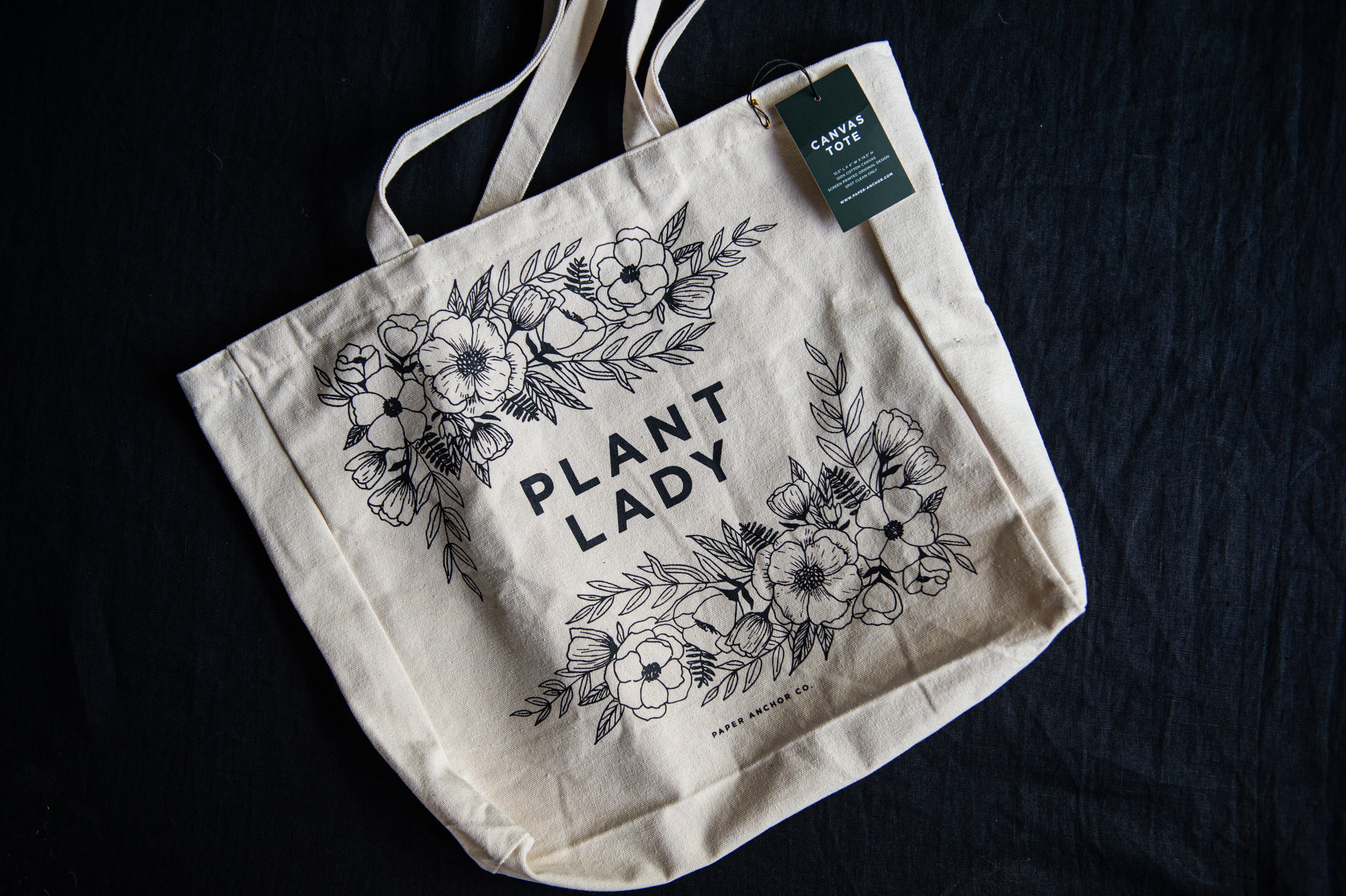 Canvas Tote that says Plant Lady and has floral designs
