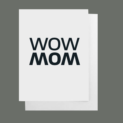 White greeting card with black text that says "WOW MOM" blank inside