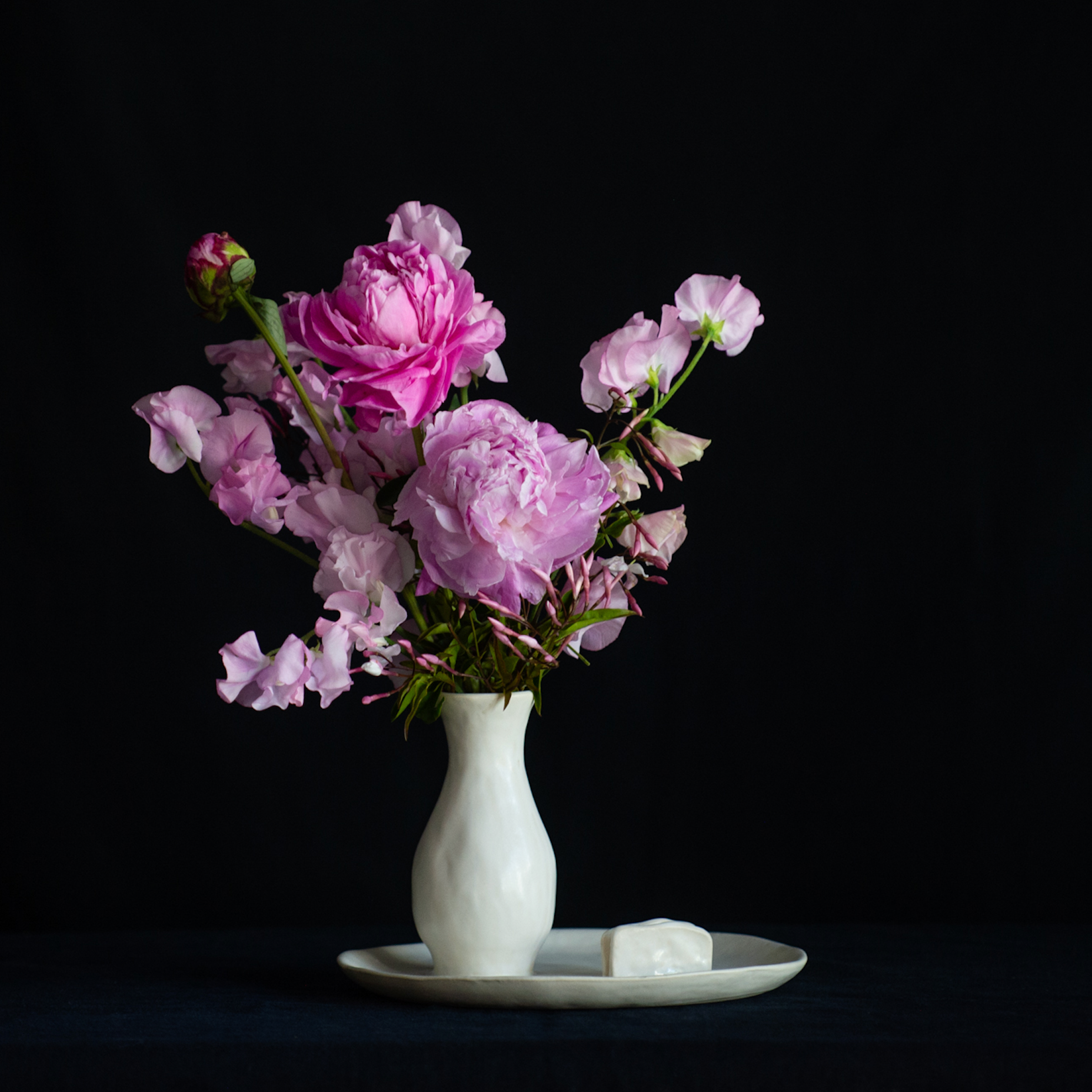 Bud vase tray with card holder. Vase filled with peonies and sweetpeas for Mother's Day