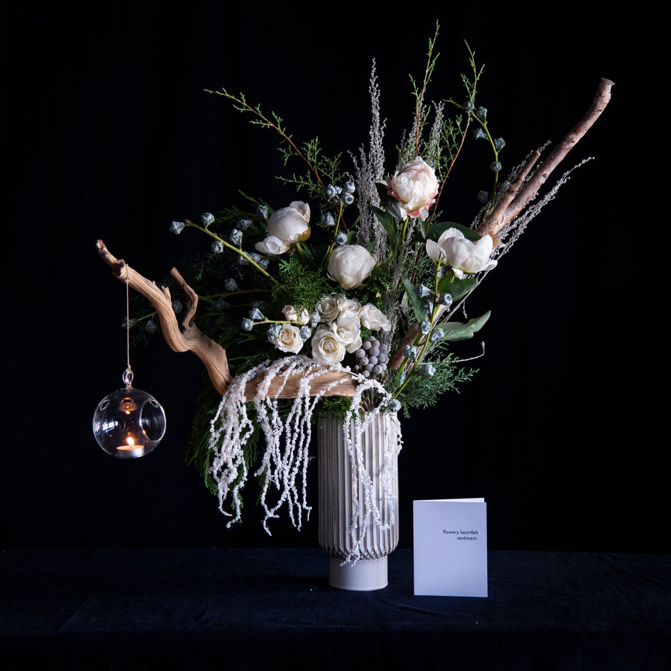 tall holiday floral design