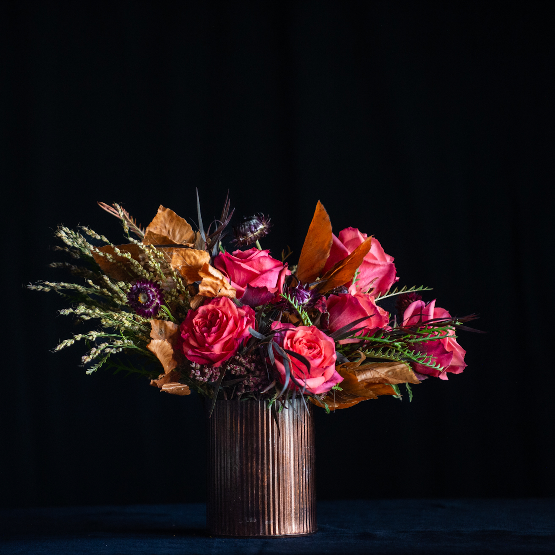 Bedside rose design with fall foliage