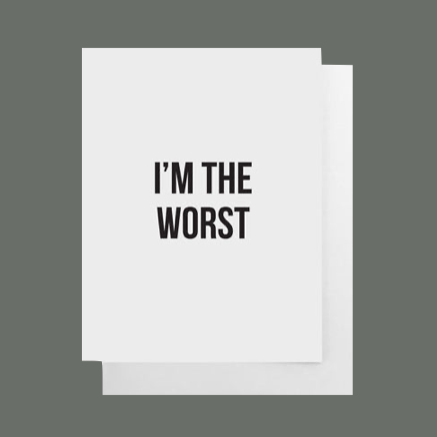 White greeting card with black text that says "I'M THE WORST" blank inside