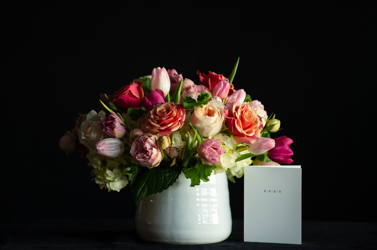 A dozen garden roses with hydrangea, roses and tulips for Valentine's Day  made by a local florist