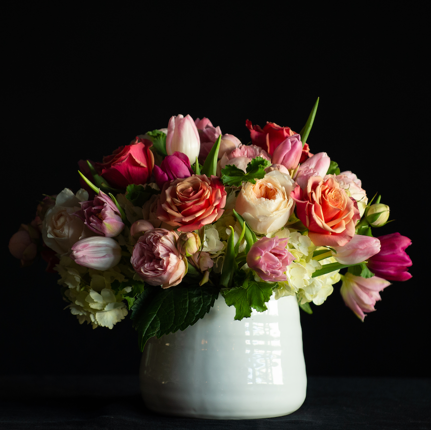 A dozen garden roses with hydrangea, roses and tulips for Valentine's Day  made by a local florist