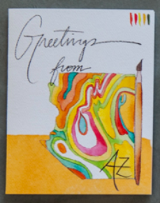 Watercolor card with the state of az in watercolor and the words greetings from az
