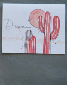 Watercolor card with pink saguaro cactus and the word dream