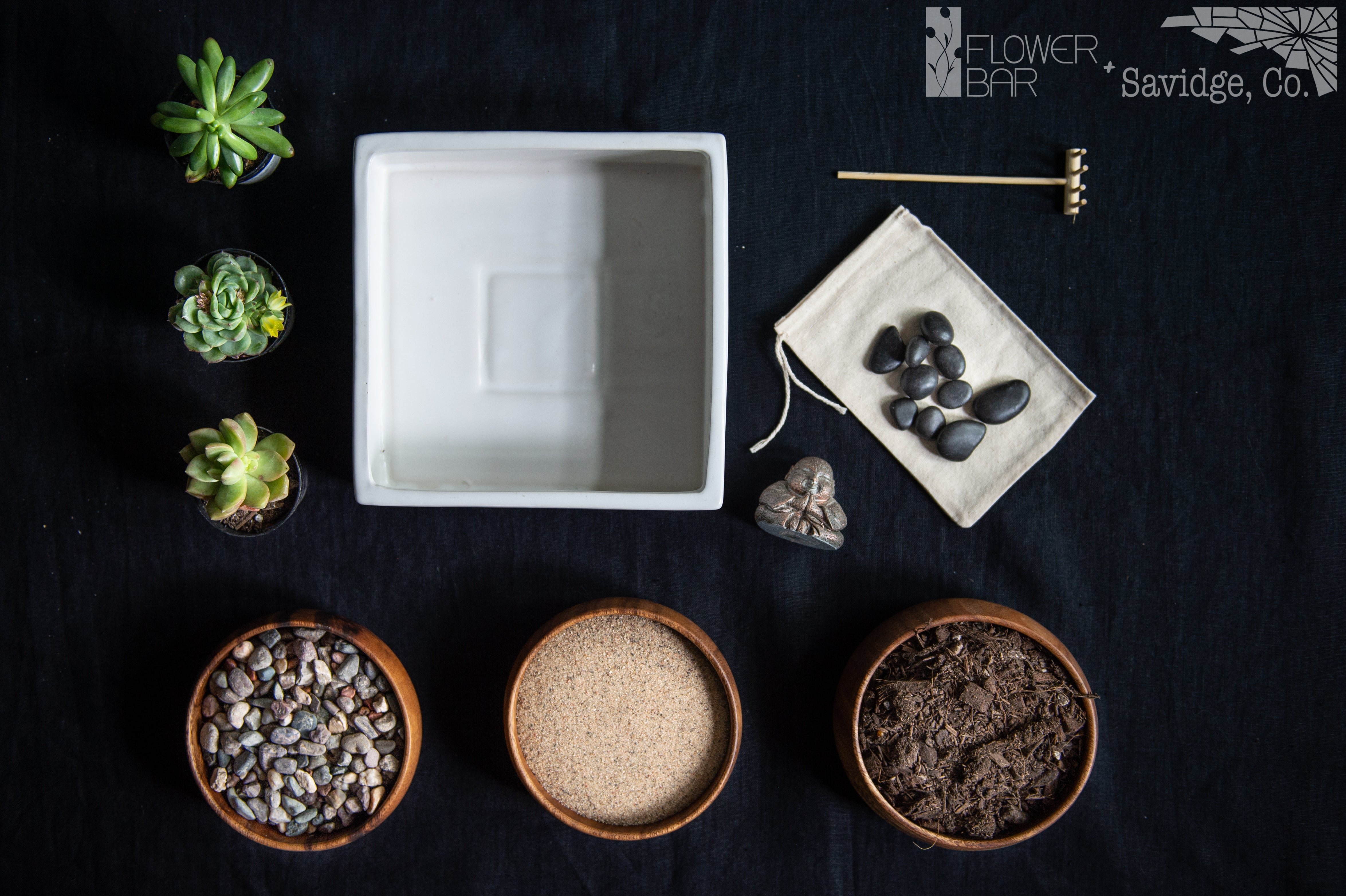 The Teahouse Plant Project Ingredients. (1) Pair of gardening gloves (1) square container (1) Miniature buddha statue (3) Succulents Bag of cactus soil Bag of small pebbles  Bag of decorative sand Flat stones & Wooden rake
