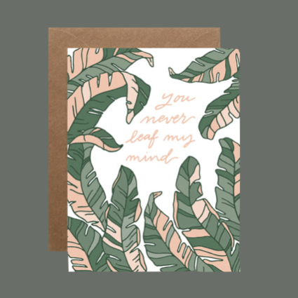 Standard greeting card that says "you never leaf my mind"  Blank on the inside.